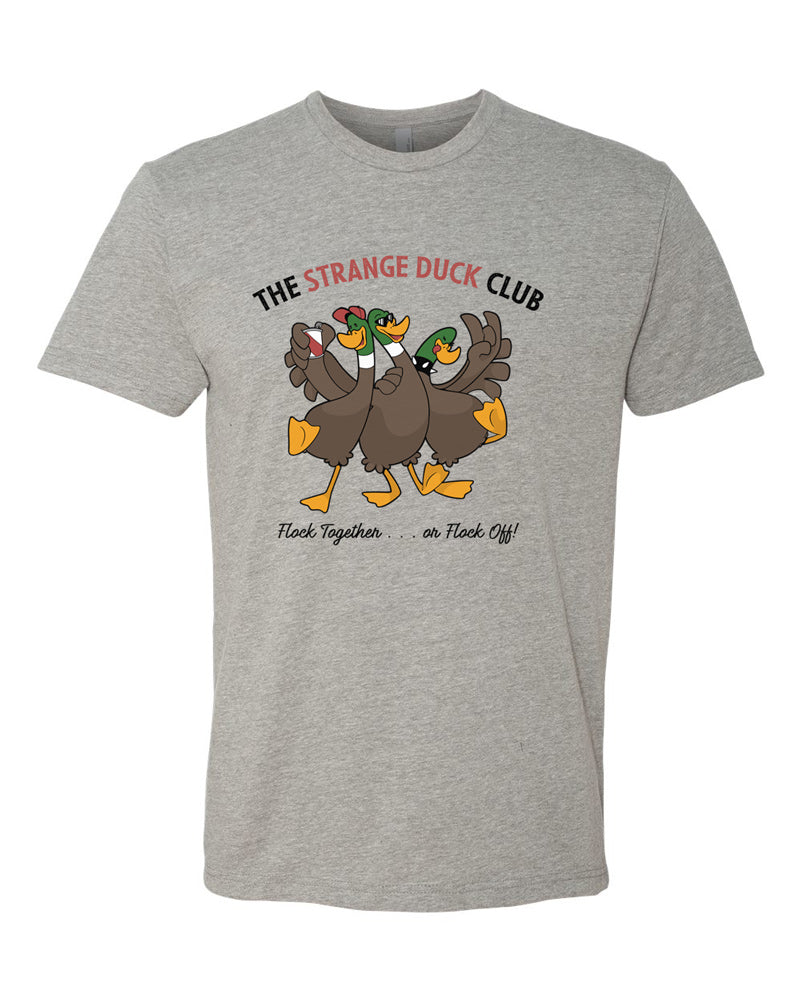 Dark heather tee with full-color cartoon image of three ducks partying. Text in black and red reads "Strange Duck Club - Flock Together . . . or Flock Off!"