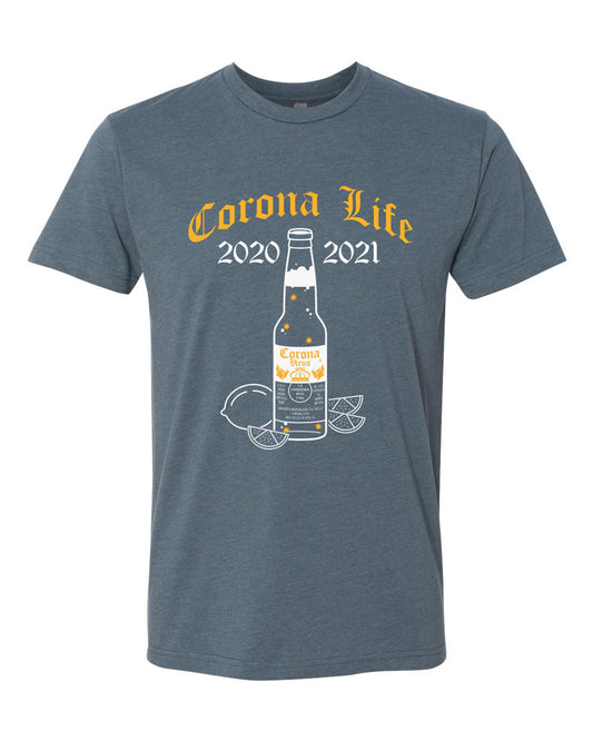 Indigo tee with gold blackletter text that reads "Corona Life 2020-2021" over white beer bottle with small gold coronaviruses inside.