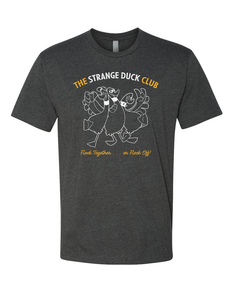 Charcoal tee with cartoon image of three ducks partying. Text in white and gold reads "Strange Duck Club - Flock Together . . . or Flock Off!"